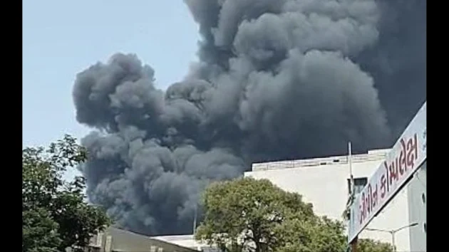Air India jet carrying 242 crashes, at least 1 passenger survives