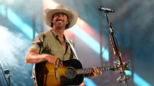 A playful Riley Green talks parents, pairings & performances ahead of the CMAs