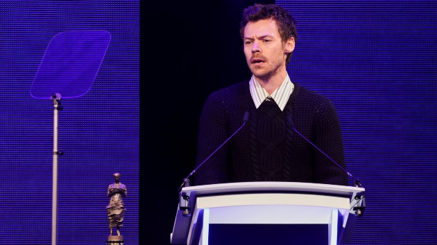 Harry Styles takes a break from tour to present award to musical hero