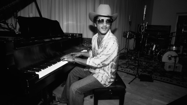 Bruno Mars treats high school seniors, scores Latin chart success